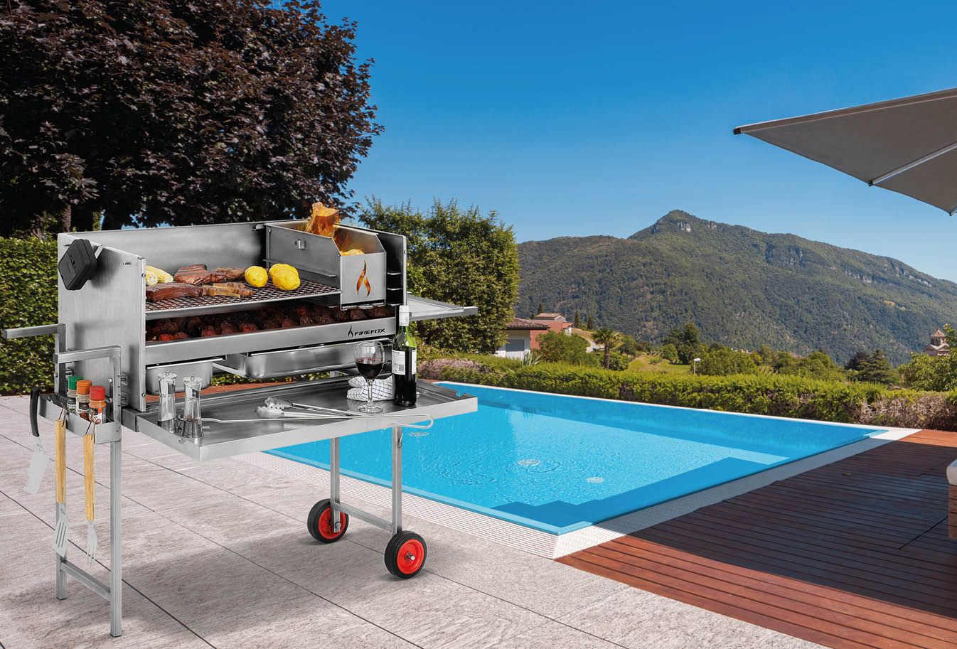 Large modern pool with two sun loungers for sunbathing and an open umbrella. View of the mountains of Switzerland. Nobody inside.