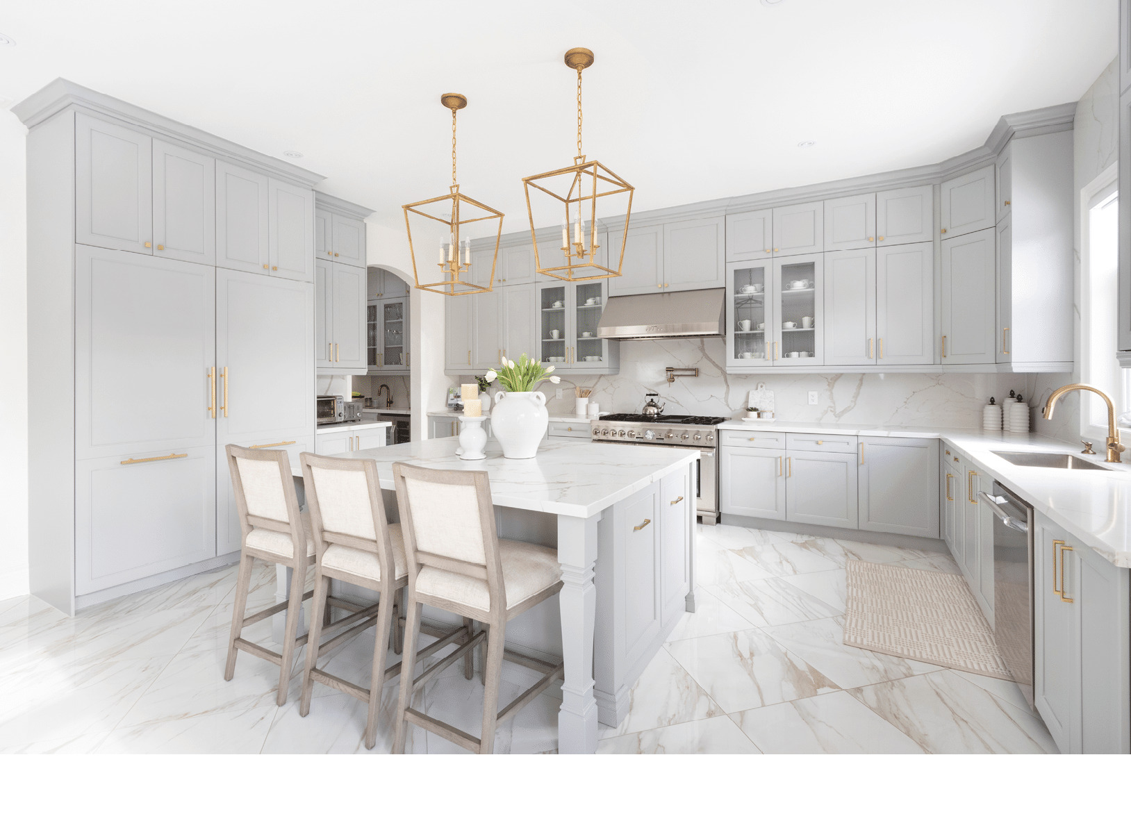 Brampton, Ontario / Canada - March 5, 2019: A modern white kitchen with a traditional touch custom designed by Toronto interior designer Jessica Mendes.